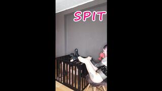 Lady Angela submissive in a cage spitting on his face ankle boots