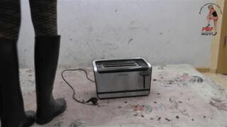 Toaster crushed under riding Boots