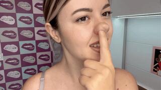 sexy blonde picking her nose