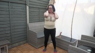 stripping playing with 10 inch Dildo on garden bench