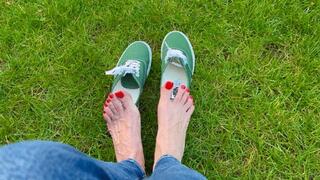 shoeplay with green sneakers on the grass