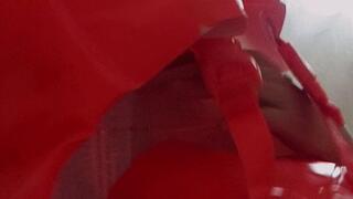 Alla inflates an inflatable swimming vest with her mouth