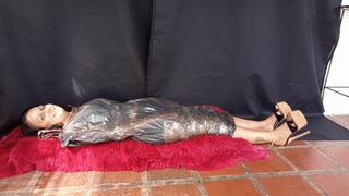 Many tickles on the feet and body to woman completely wrapped (3)