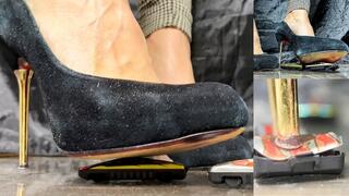 Crushing toy cars with high heel shoes