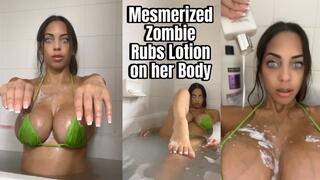 Mesmerized Zombie Rubs Lotion on her Body