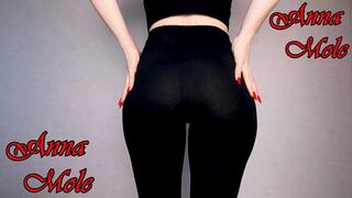 Wearing black cotton leggings, I stroke my ass and spank my ass as hard as I can