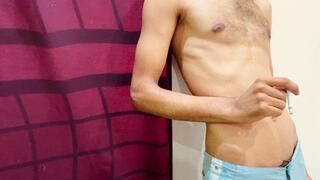 Shirtless in my room alone standing against the wall, restless, breathing heavily while smoking