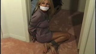 Beautiful barefoot businesswoman Casey Cartwright was gagged after she curled up in bondage on the floor!