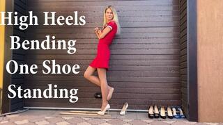 High heels bending, one heel standing, high heels crush, sinking heels into wooden planks