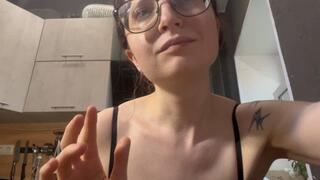 Emma plays with her fat arms