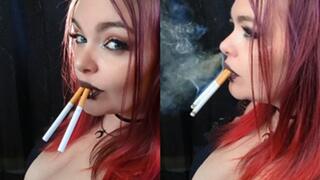 Smoking two Marlboro 100's side profile