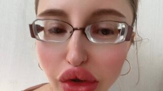 Girl in Big Huge Eye Glasses is telling her life story about her worries and difficulties in life story in Russian language