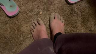 Completely mud encrusted feet and toes and everything in between