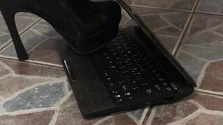 Metal tip heels destroy laptop after long day at work