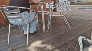 The girl with the big ass wrapped in jeans at the bar table 4K