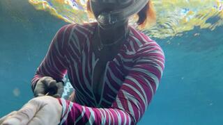 Zebra dive suit in the spring with deep cleavage view and legs on display part two