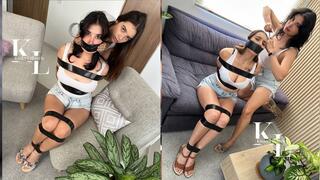 Secret Ambusher Game: Simona Must Catch Luana (Sandals, Jean Shorts, Wrist Watch, White Tank Top, Black Tape, Mouth Stuffing, WrapGag, Escape, Role Reversal)