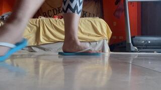Dirty feet in flip flops leggings housecleaning