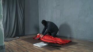 Bondage with red tourist bag with vibro and straps in vacuum bag