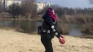 play with small balls on river
