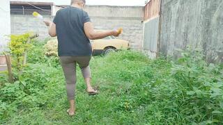Two women scratching their feet while cleaning a car in the middle of a bush (1)