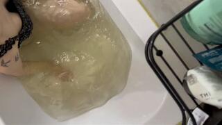 Emma in the bath, deep breath, no hands and no bubbles