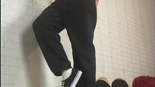 Hard trample in My Vans sneakers on tied and blinded human rug (vertical view)