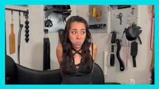 You find a girl with her mouth stuffed and gagged