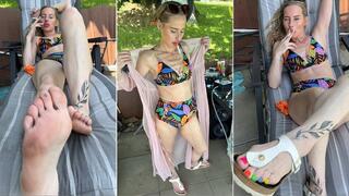 Smoking a Marlboro 100 on my way to the pool in bikini and Birkenstock sandals