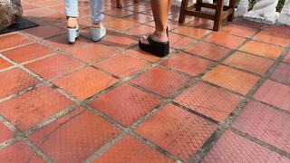 Dalilah and her friend have fun on the terrace and play with their feet