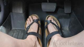 Fifi pedal pumping in Birkenstocks in a store parking lot replay