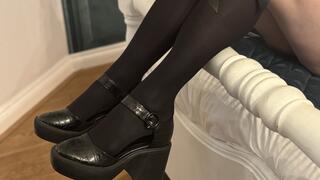 Dangling in my black nylons and chunky platform heels