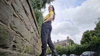 Outdoor jogging bottoms wetting by the road peeing