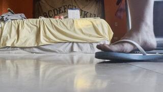 Dirty bare feet in the bedroom