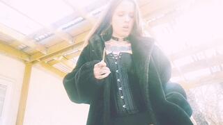 Smoking Outside In A Corset and Fur Jacket