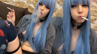 Goth Blue Hair Babe Smoking on sofa