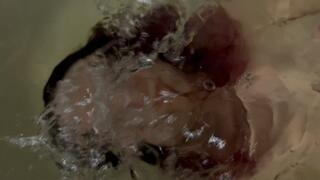 Emma plays with holding her breath in the bath and is followed by a phone camera (part 12)