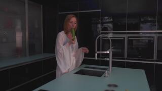 Very hot amateur uses a cucumber to masturbate in kitchen