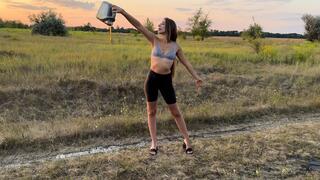 Pours motor oil onto the ground (custom video)