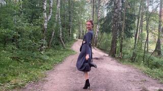 The girl in the shoe Walking in high heels through the woods and looking for dirt where she could crush her shoes, she finally found the dirt