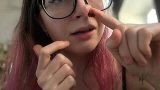 Emma plays with her nose, shoves hot sauce and napkins into her nose, makes a pig nose - part 25