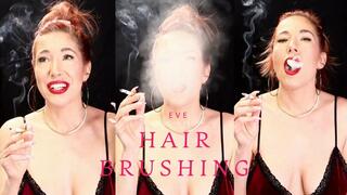 Hair brushing and hair play while smoking