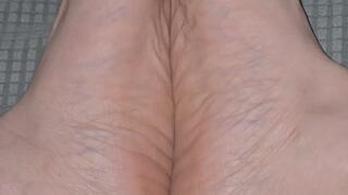 Big feet soles together