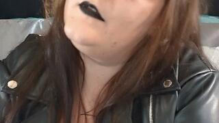 Bad girl smoking in leather