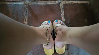 Milah Arches modeling her clogs and flat sandals with JOI