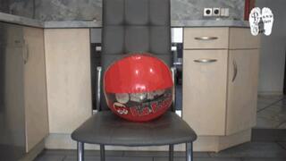 Two waterballs crushed under Ass