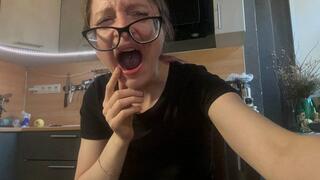 Emma gapes with her big mouth and plays with glasses - part two, where Emma yawns