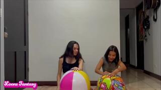 Akina and Owllete blow up and pops 2 beach balls