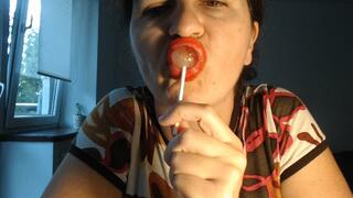 Cherry lollipop and red lips