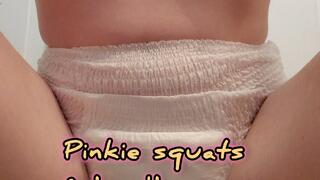 Pinkie squats and loudly pees in her pullup